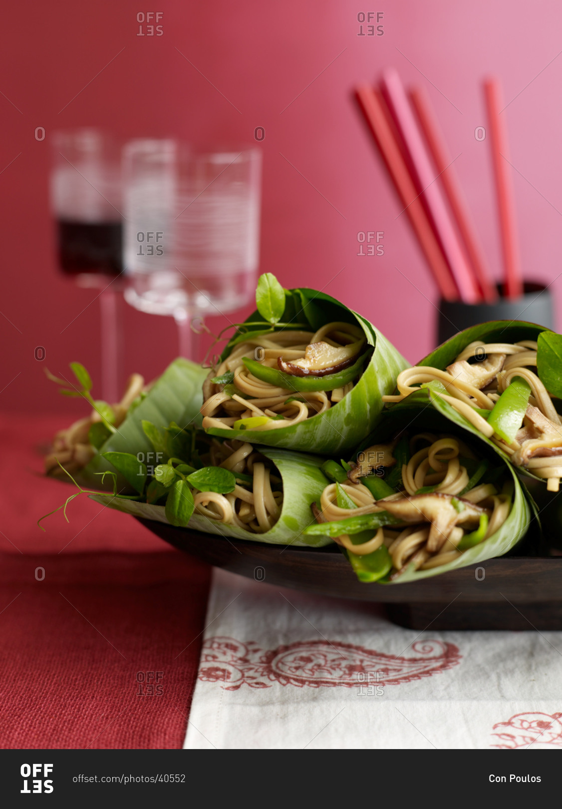 Shiitake and scallion lo mein served in banana leaves stock photo OFFSET