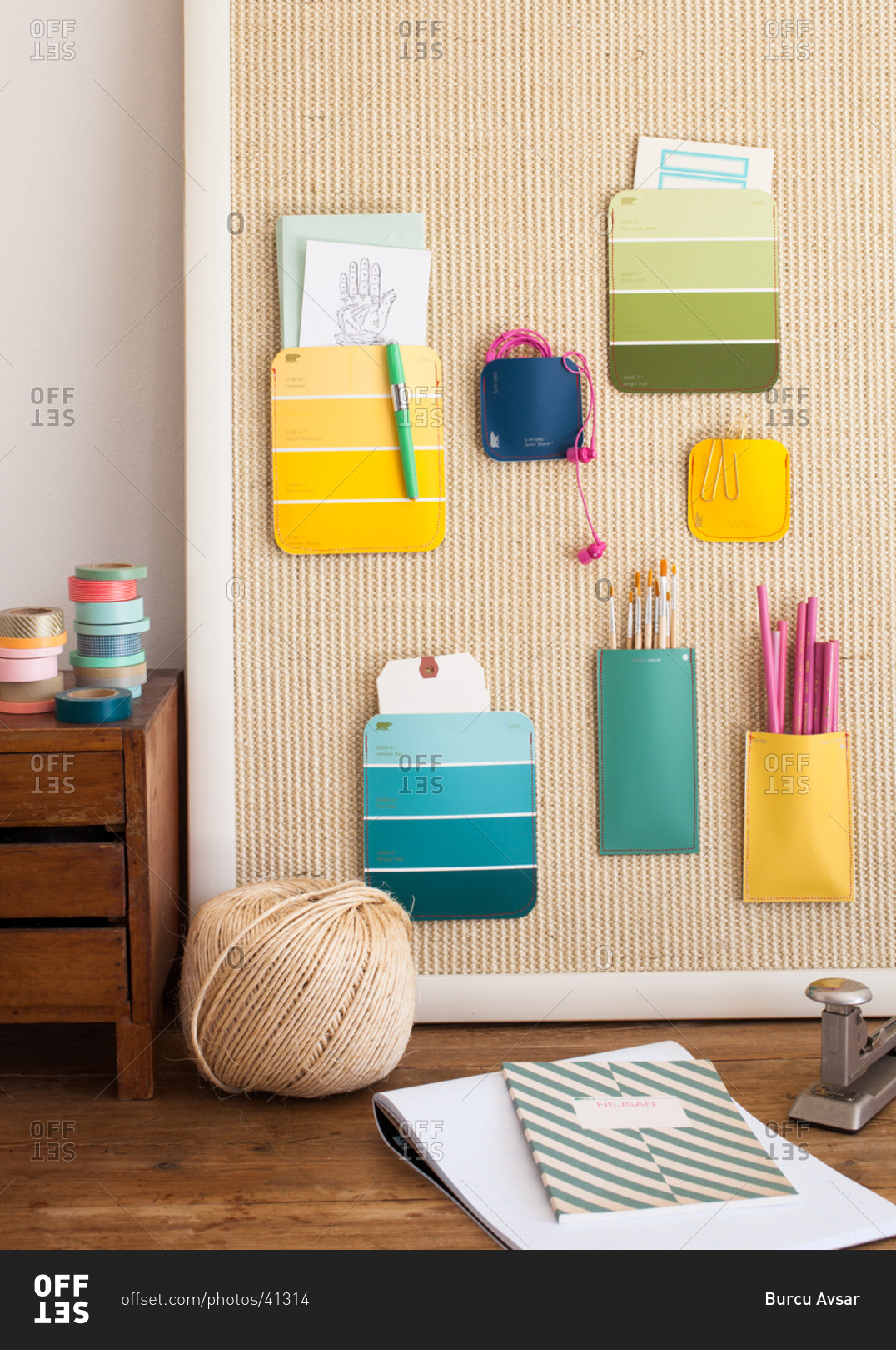 Desk with board and stationery stock photo - OFFSET