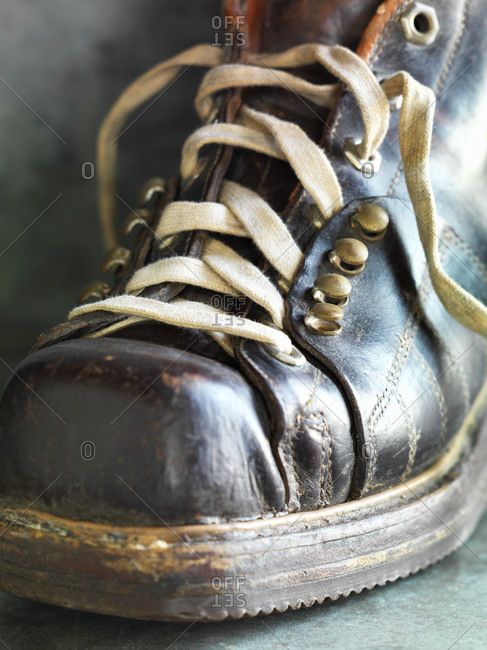 Close-up of vintage snow boot with white shoelace