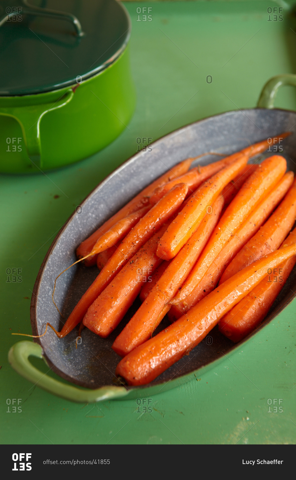 Pile of cooked carrots in oval-shaped dish