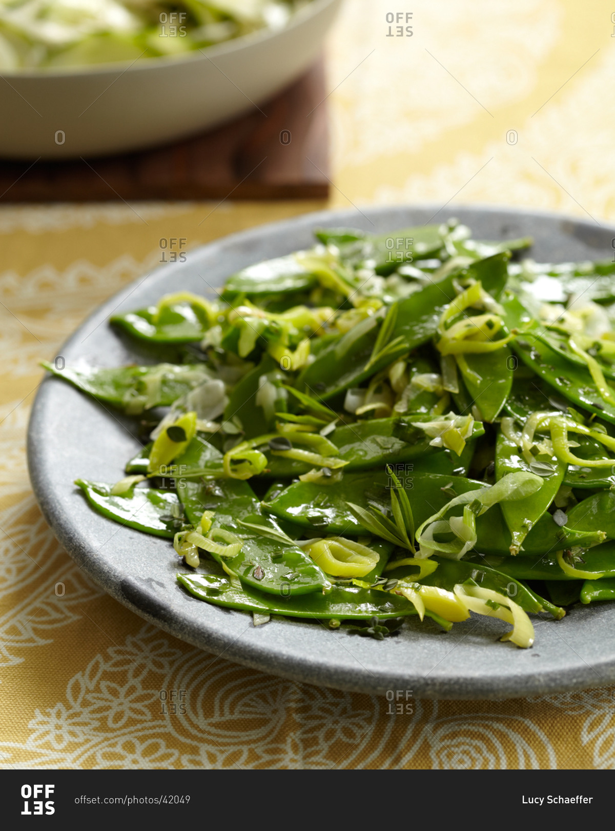 Snow peas with leek and herbs