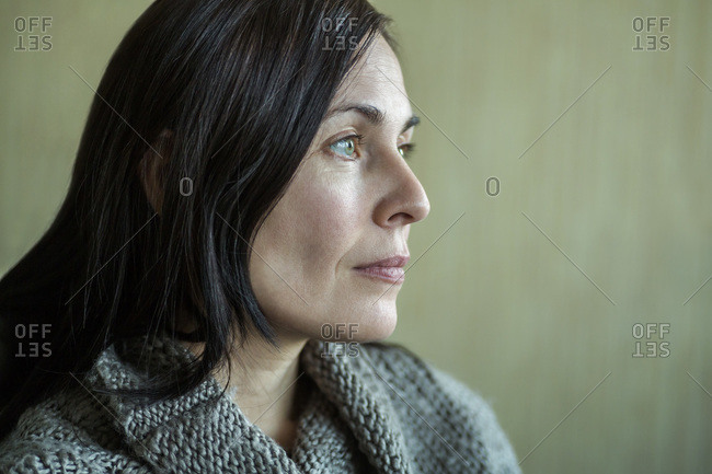 Pensive woman looking into distance