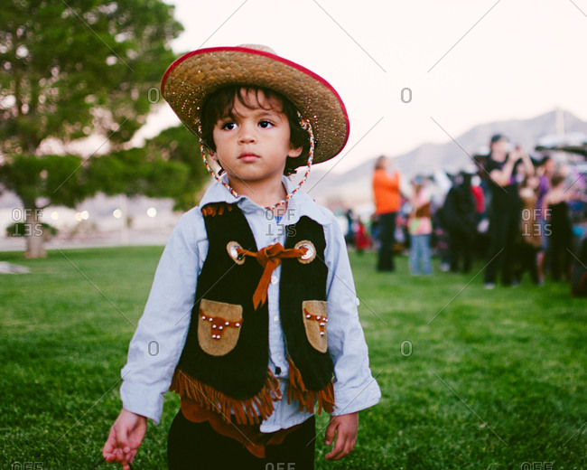 A little boy dressed as a cowboy for halloween
