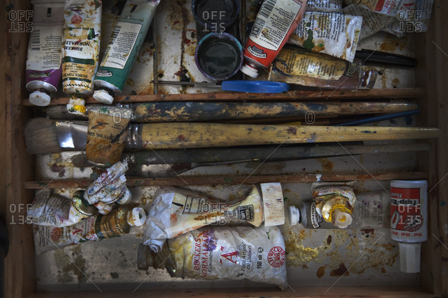 Messy tray of used watercolor paints stock photo - OFFSET