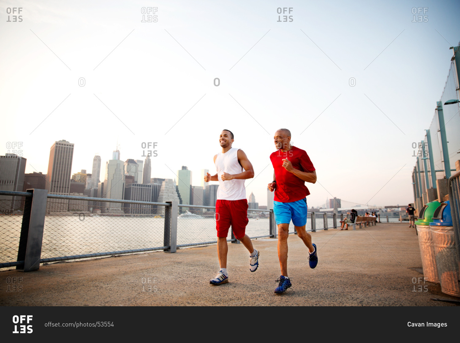 Two men running together