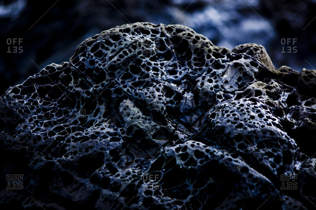 Texture of eroded rock on seashore