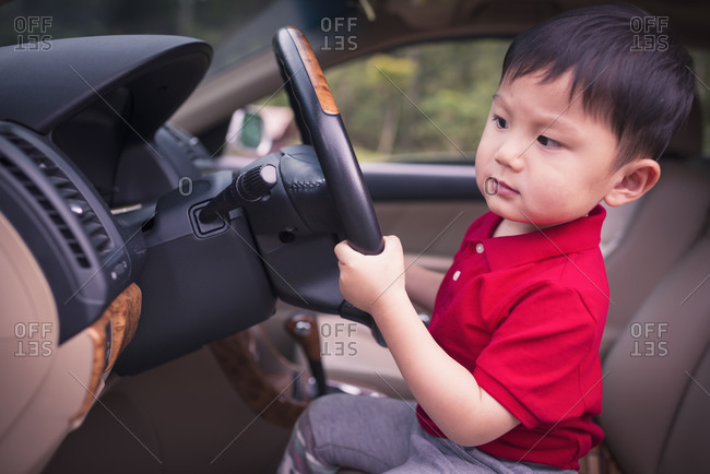 Small boy hot sale driving car