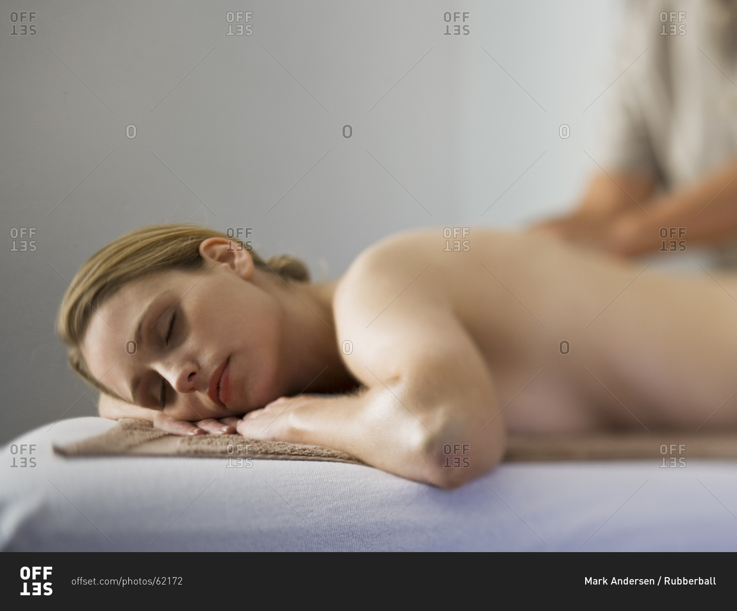 Woman giving other woman back massage