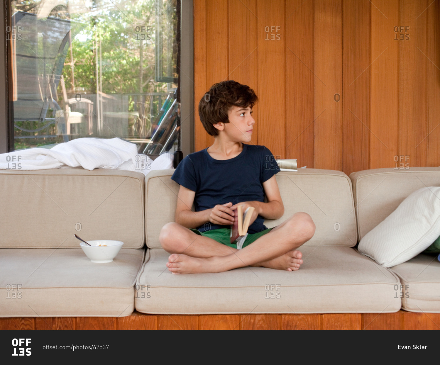 Teen Boy Sitting In Living Room