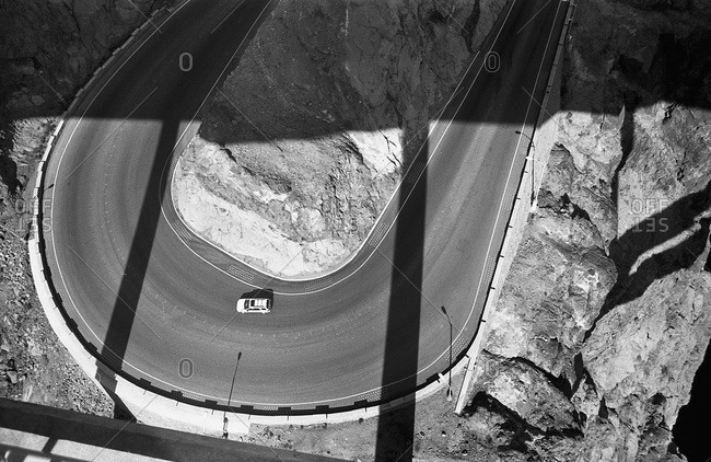 A car on a two lane highway, high angle view
