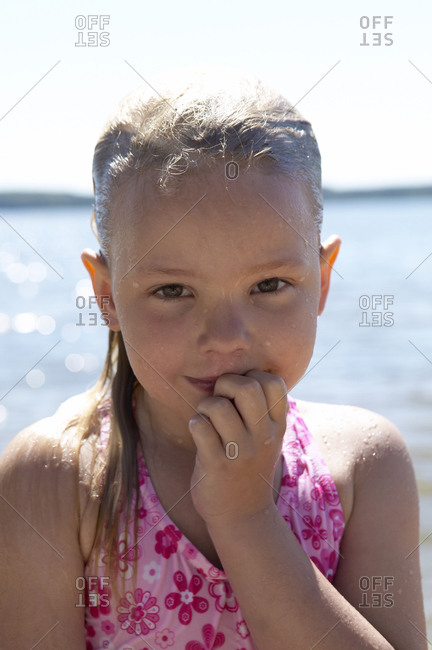 Portrait of a girl wet from a swim