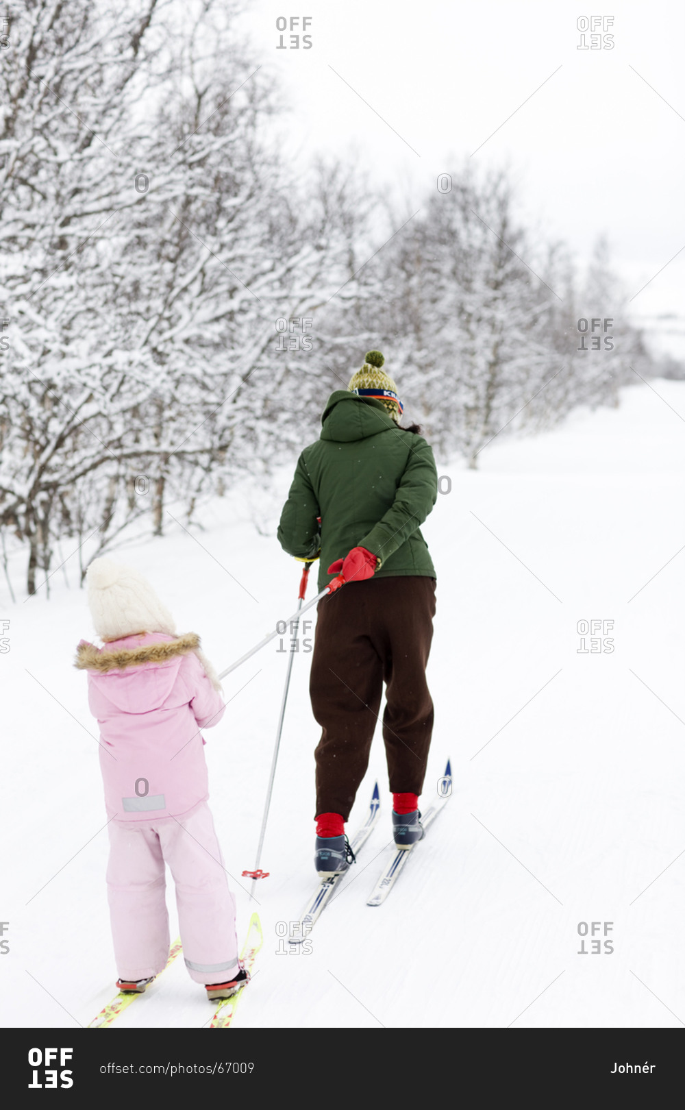 Mother and daughter skiing,  Sweden