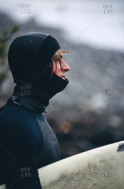 A surfer wearing wet suit