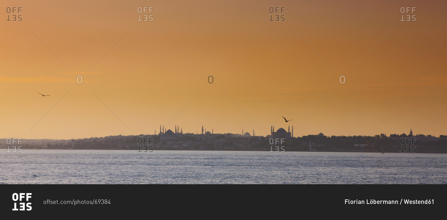 View of Blue Mosque and Hagia Sophia during sunset