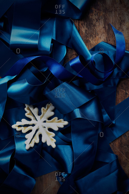Blue ribbon with snowflake decoration