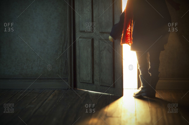 Puppet opening a door