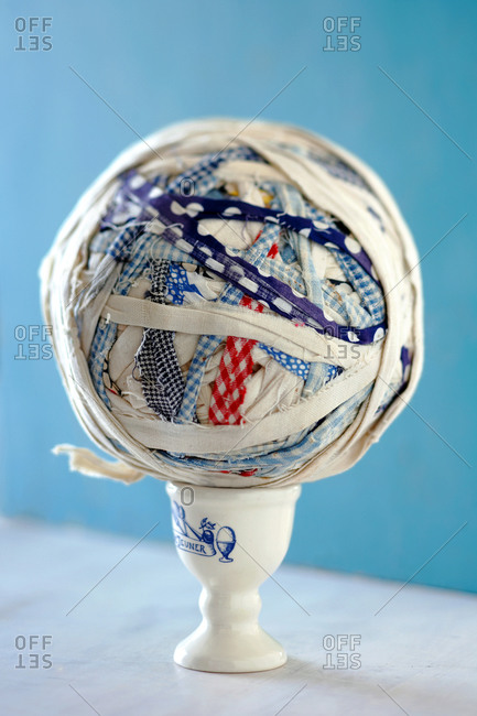 Fabric ball on an egg cup