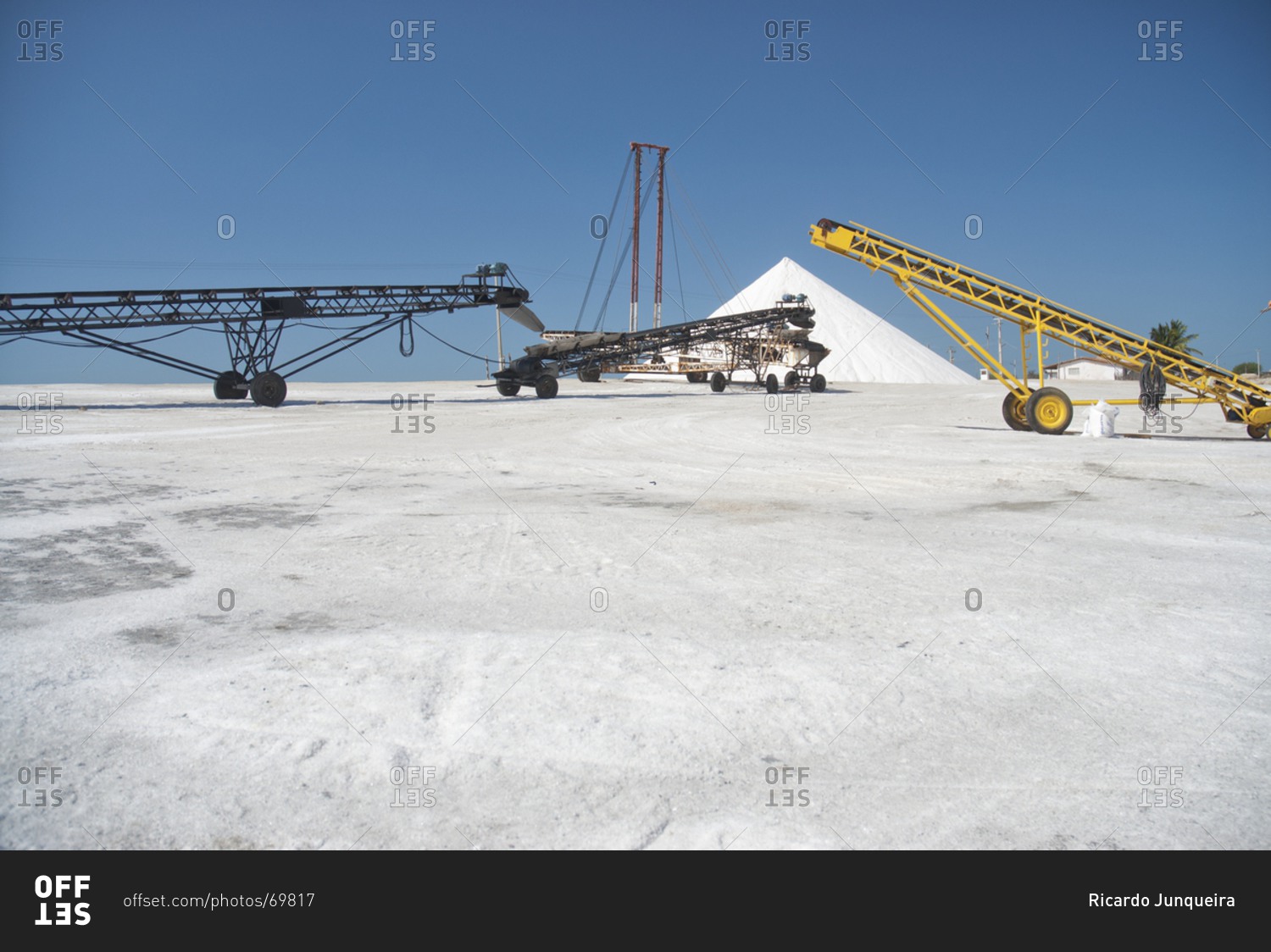 Machinery harvesting in salt field