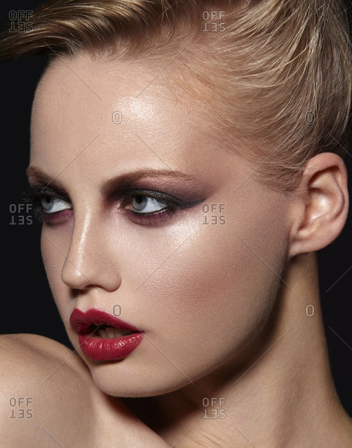 Model poses in dramatic makeup
