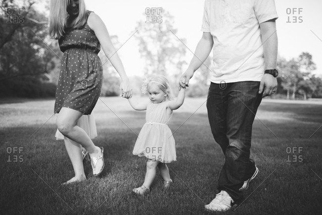 Low section view of family walking together