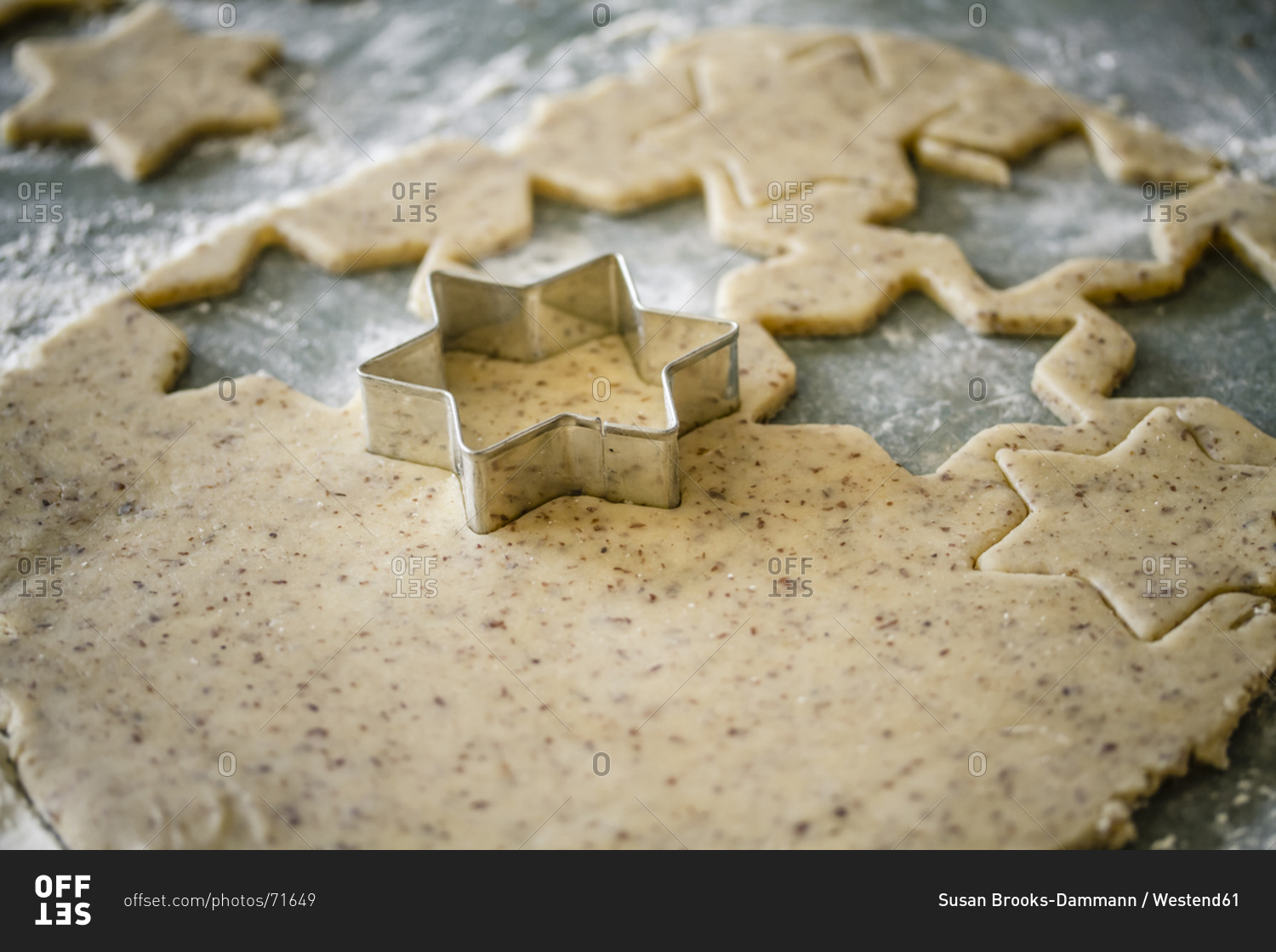 Cutting out star-shaped cookies