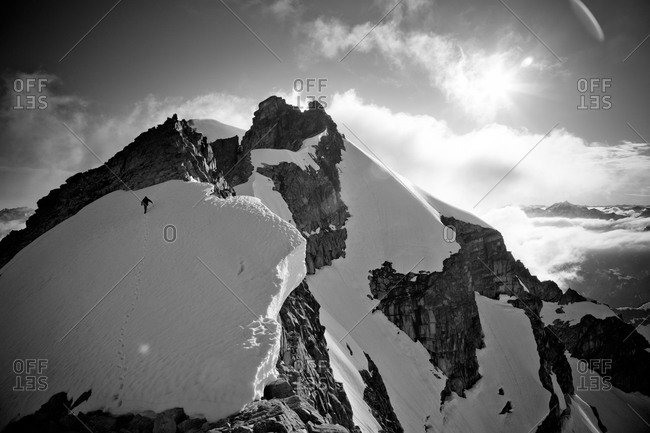 Climber trudging toward the apex