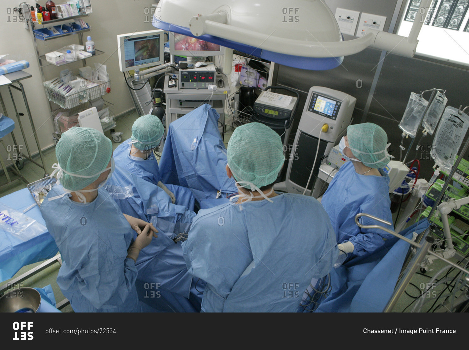 Surgeons performing Myomectomy procedure, removing uterine fibroids