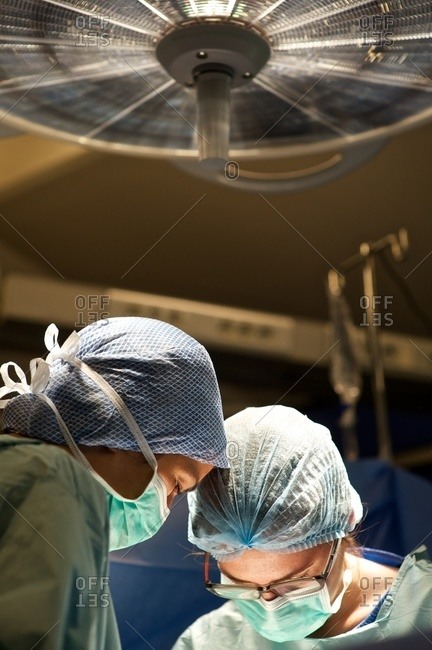 Surgeons Performing Myomectomy Procedure, Fibroma Of The Uterus Stock ...