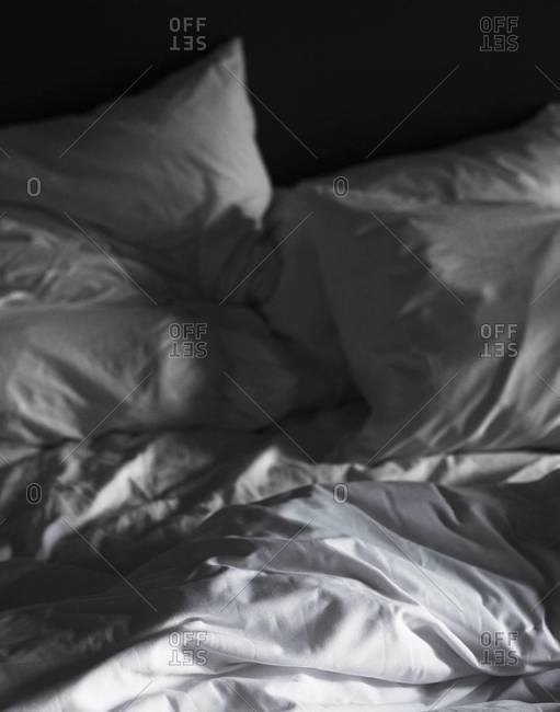 Close up of a bed with bedclothes