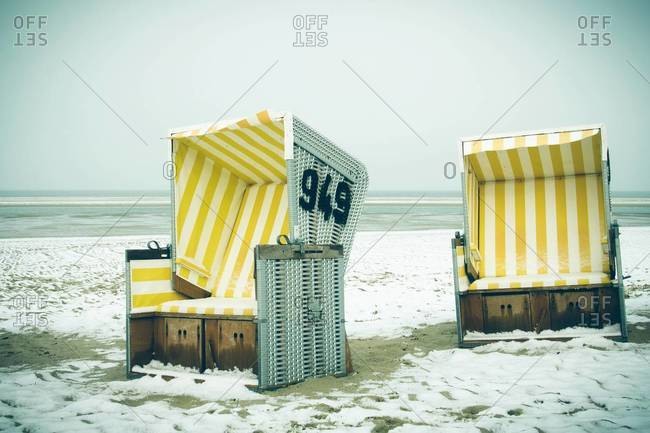 covered beach chair stock photos OFFSET