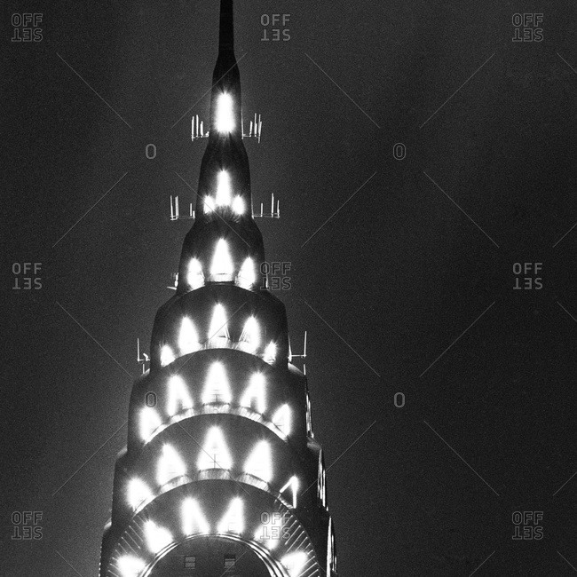 Illumination of Art deco style Chrysler Building in Midtown Manhattan at night