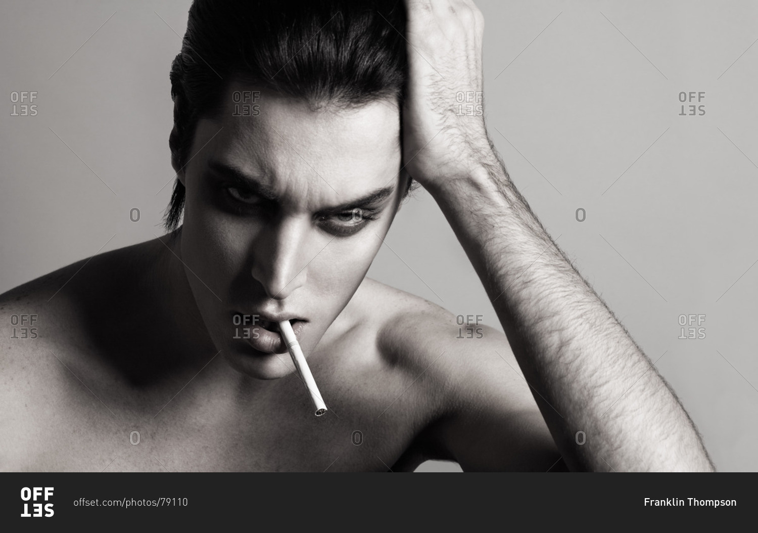 Portrait of an androgynous male model stock photo - OFFSET