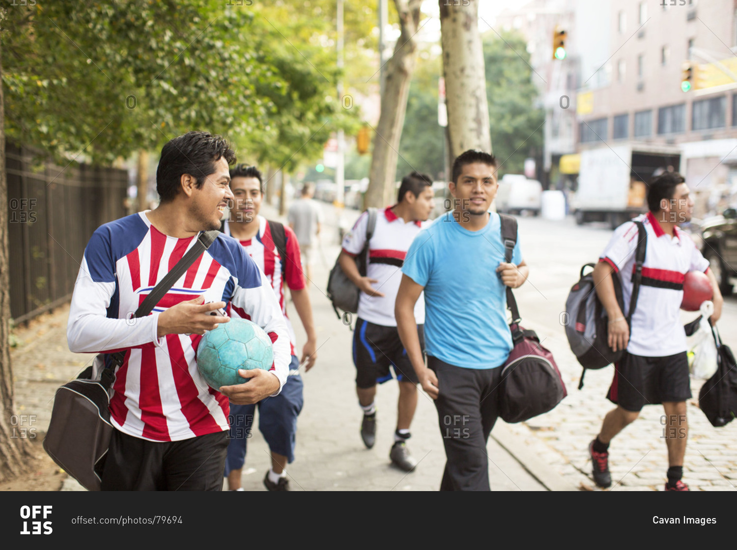 Soccer team walking on street