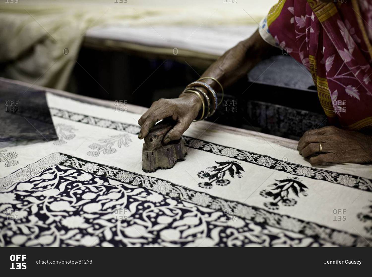 Indian woman hand block prints on textile