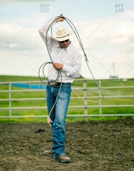 rope cowboy stock photos - OFFSET
