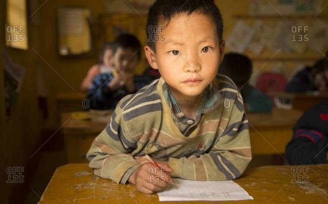 Sapa, Vietnam - April 1,2013: Portrait of a student in the classroom