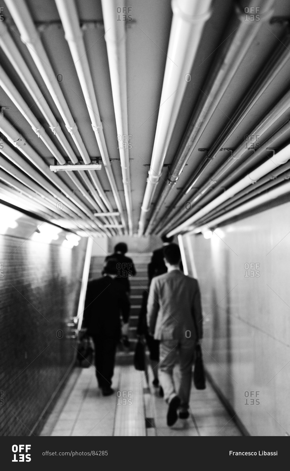 People walking  in Underground Marunouchi, Tokyo, Japan