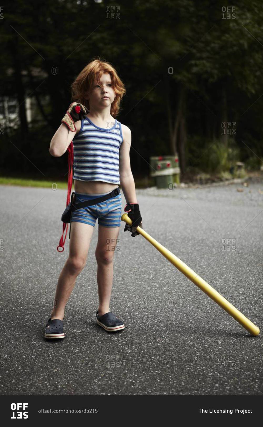 Boy playing outside in his underwear stock photo OFFSET