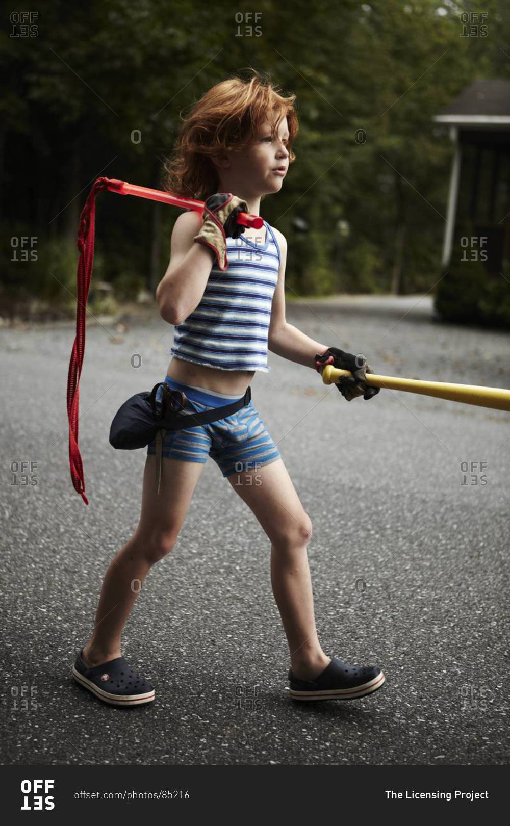 Boy playing outside in his underwear stock photo OFFSET