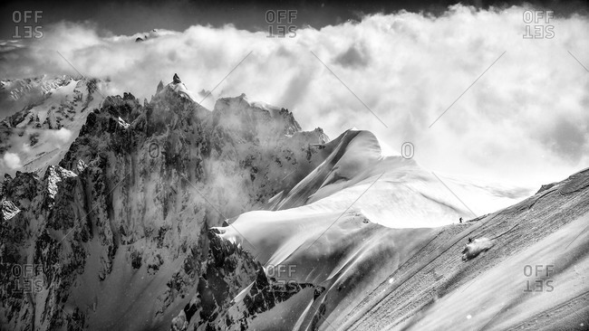 Sportsman skiing at Midi ridge, Chamonix, France