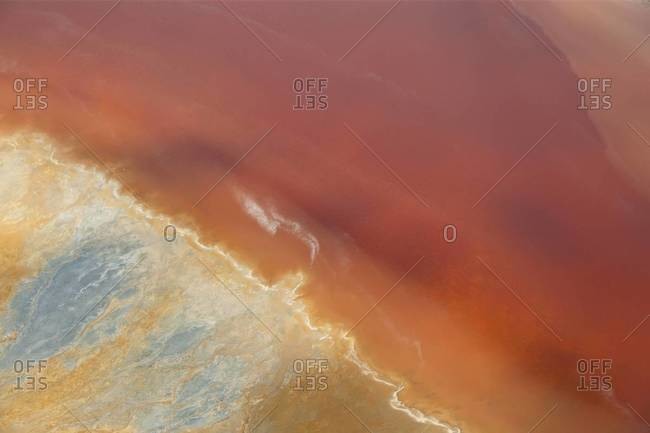 Aerial shot of oxidized iron minerals in the water at an old mining area, Rio Tinto, Huelva Province, Spain