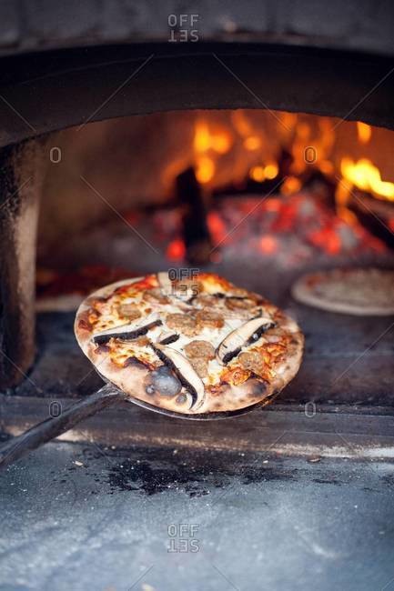 Pizza baked in a wood-fired oven