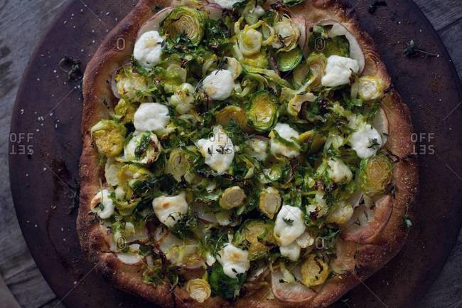 Focaccia with Brussels sprouts, potato and ricotta