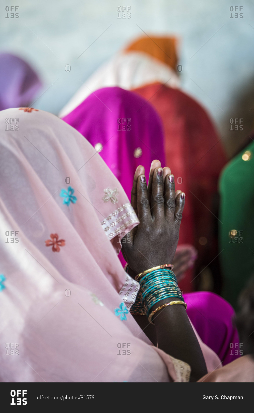 Christian woman praying in Central India