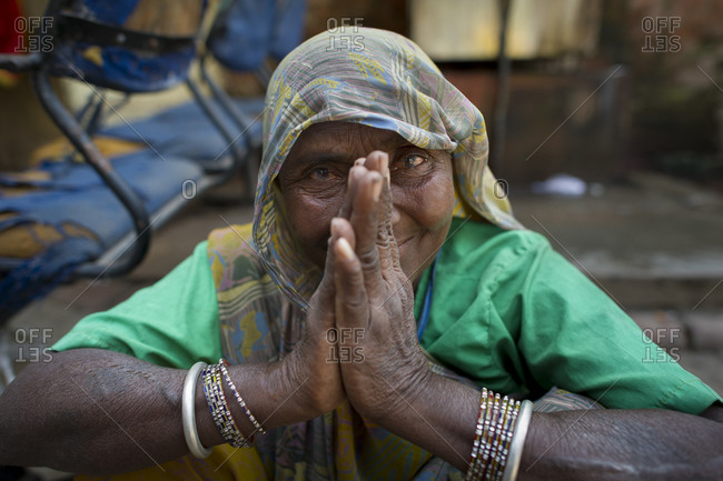Woman begging on the streets of Delhi, India