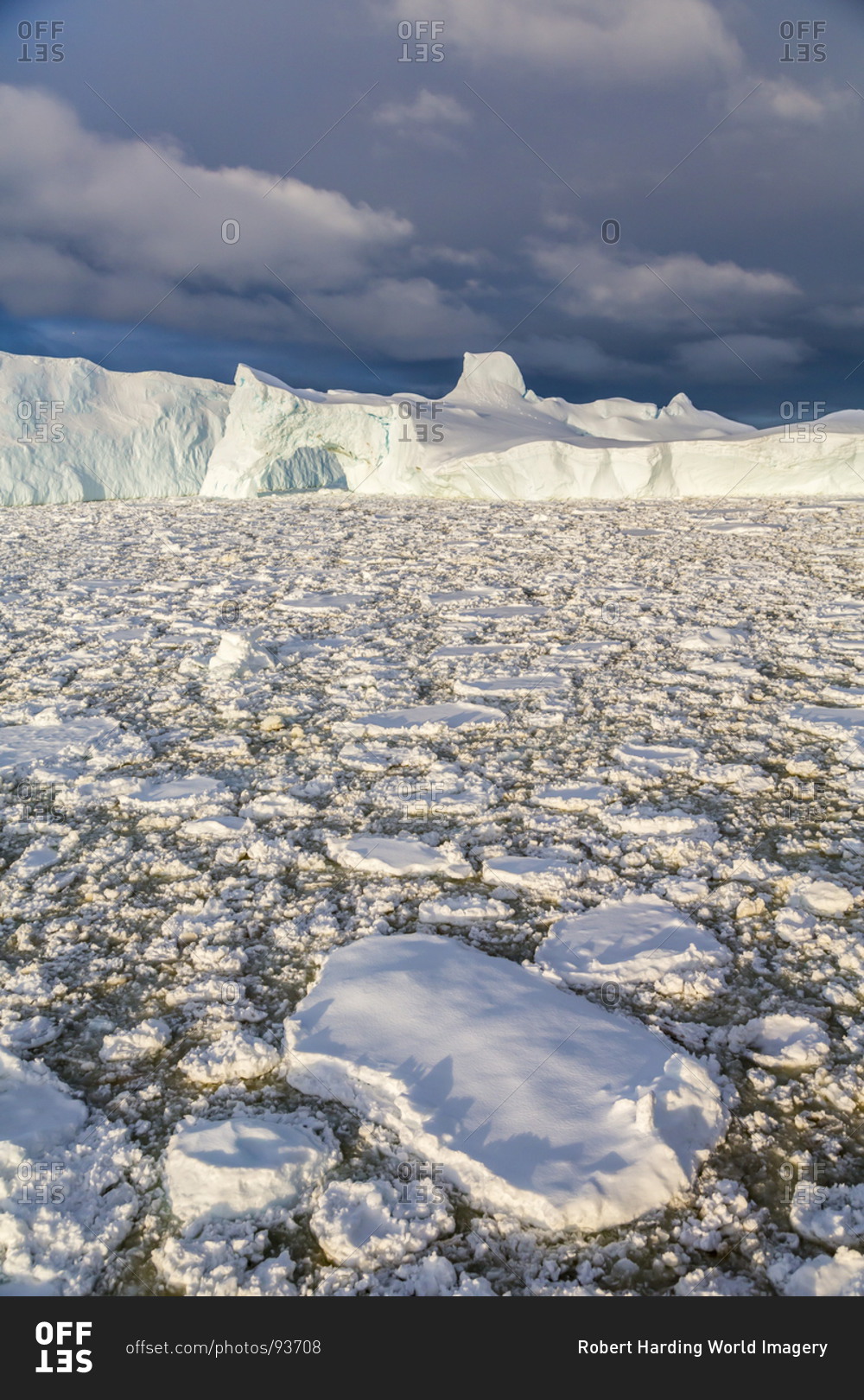 Huge iceberg amongst sea ice near Petermann Island, western side of the Antarctic Peninsula, Southern Ocean, Polar Regions