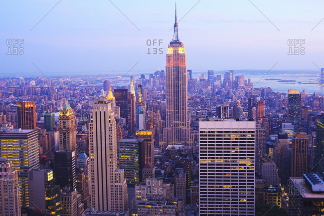 New York City, New York, United States of America, North America - May 26, 2009: Empire State Building and Manhattan cityscape at dusk.