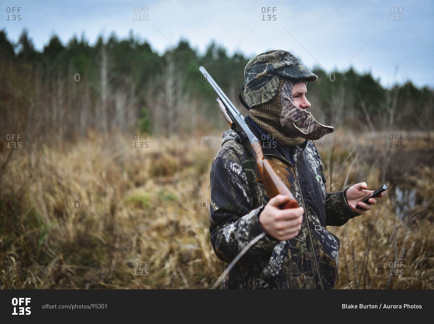 Duck hunter with a cellphone
