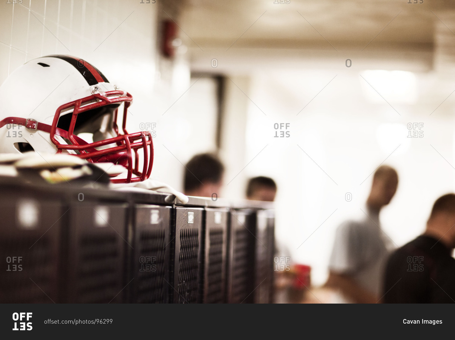 Football helmet in a locker room