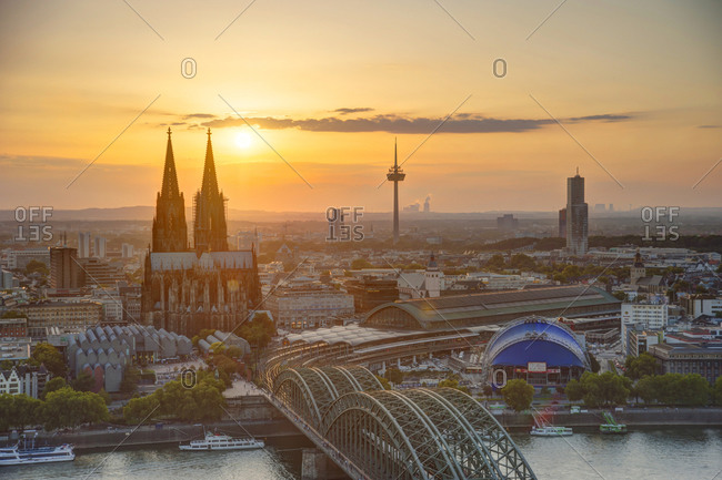 Germany, North Rhine-Westphalia, Cologne, city view with Cologne Cathedral and Colonius at evening twilight